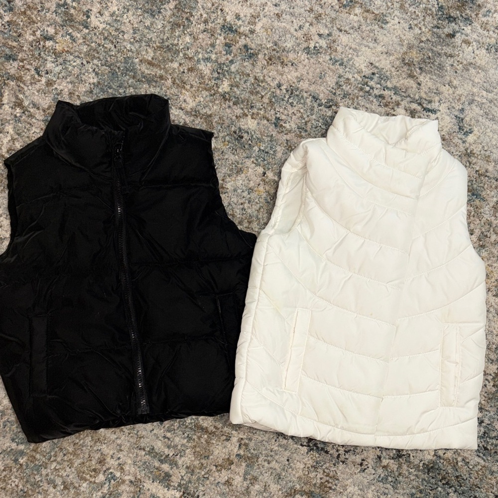 2 Kids Black and White Puffer Vests